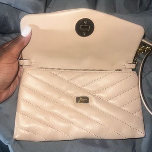 Kira chevron chain walllet by Tory Burch purchased for 348 slightly worn